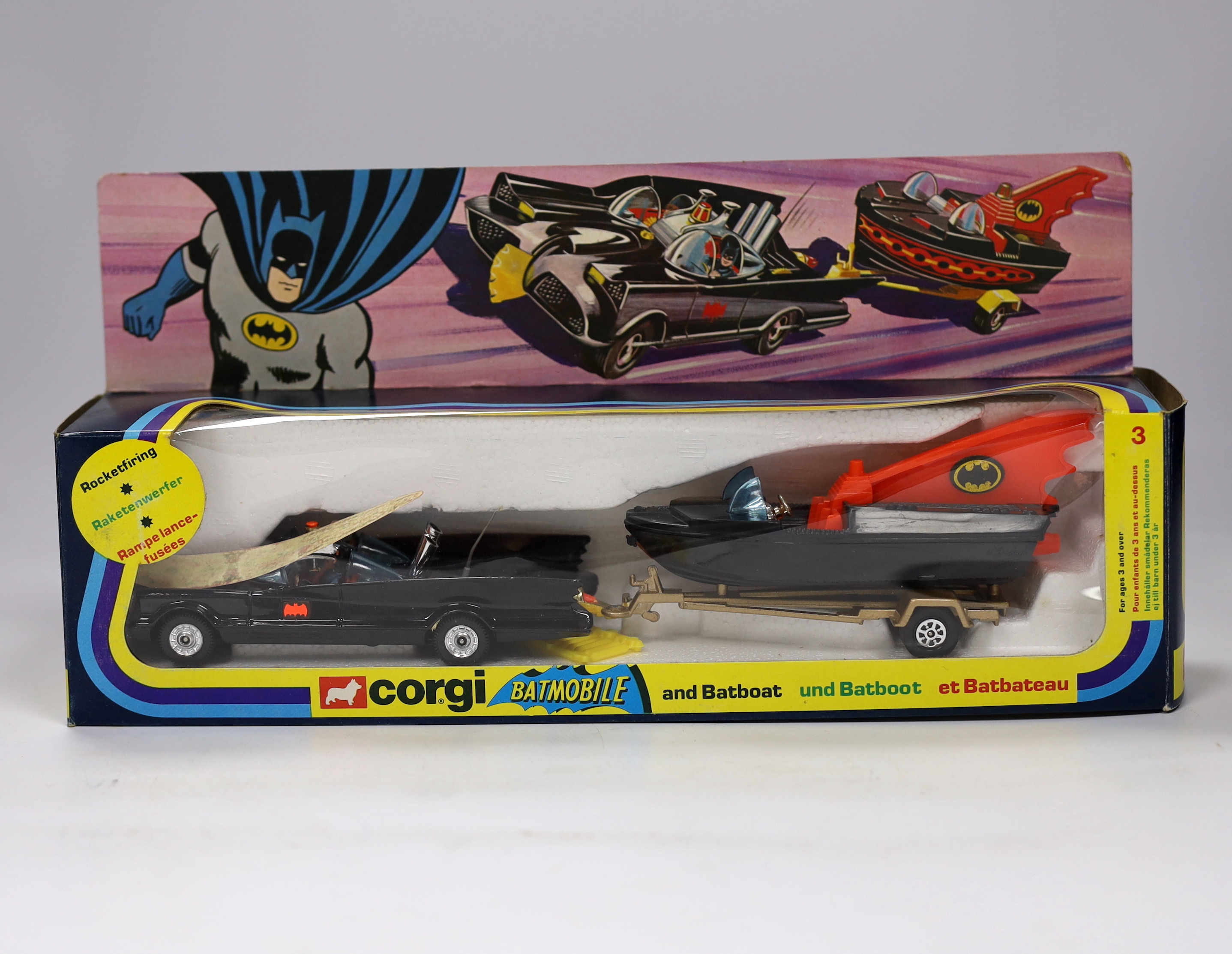 A boxed Corgi Gift Set (3) Batman Batmobile and Batboat in a late issue in striped window box, with unused yellow rockets still attached to the sprue